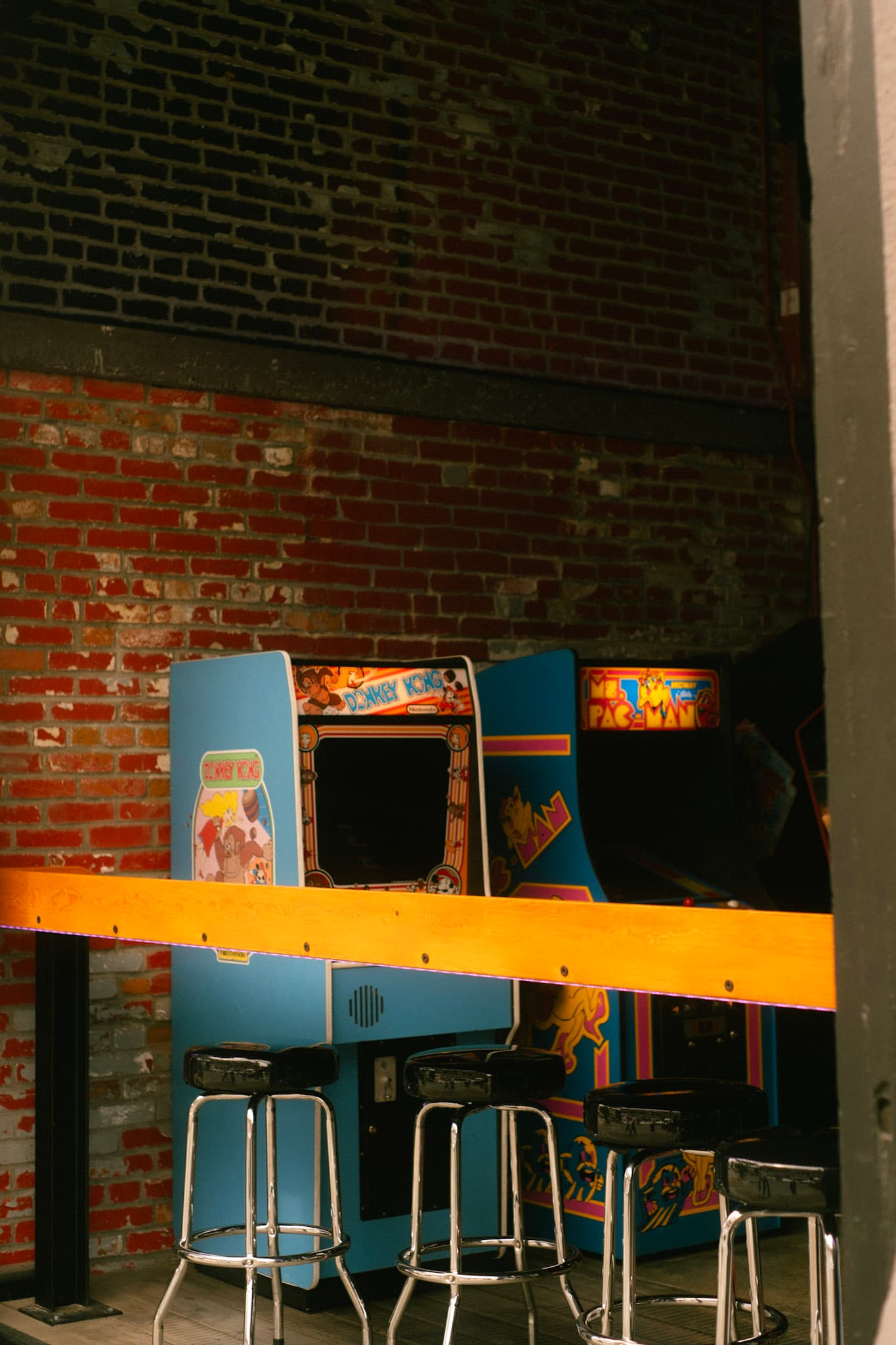 A photo of a small arcade within a bar in Victoria, BC